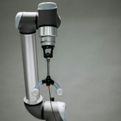 Close-up of an advanced robotic arm equipped with precision tools, showcasing technology and innovation.